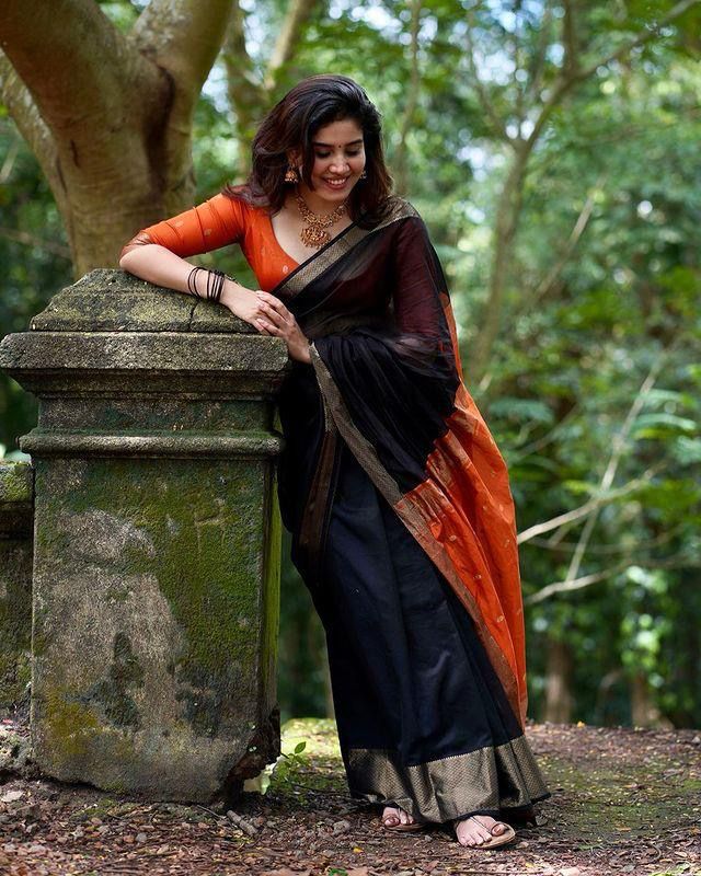 Vibrant Lichi Silk Saree with Elegant Blouse Highlights