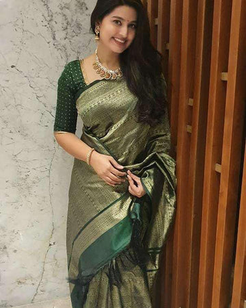 Green Plush Lichi Silk Saree with Ornate Blouse Details