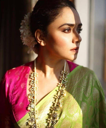 Stunning Lichi Silk Saree with Artistic Blouse Design
